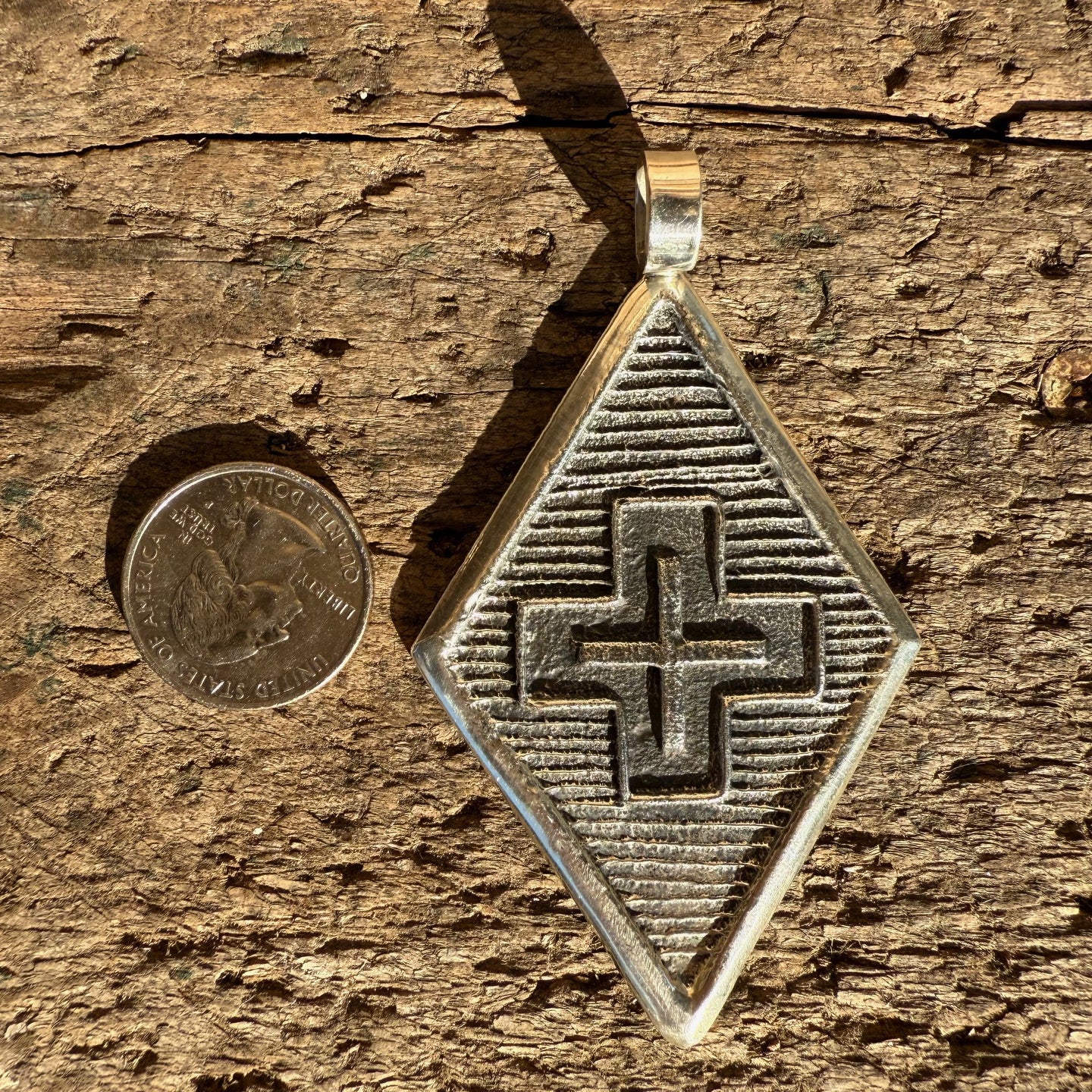 Stanford Yazzie Tufacast Pendants