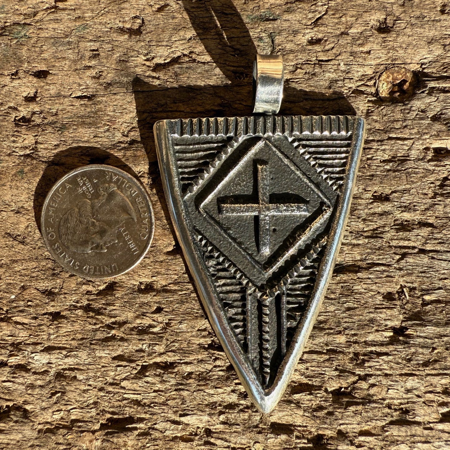 Stanford Yazzie Tufacast Pendants